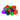 Assorted colorful PolySquish geometric squishies piled together on a white background