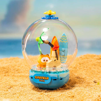 Pantasy Garfield Chill Island building set with sandcastle and surfboards under a clear dome