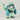 Front three-quarter view of Hatsune Miku in a pale green Zaku kigurumi costume holding a leek