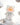 White crackle-finish Teddy LuLu figure posed among clear crystals