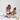 Adult and child building a creative structure with loose Newton's Tower rainbow blocks