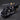 Cloud Strife riding Fenrir with the Fusion Sword raised above the motorcycle