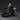 Cloud Strife standing with the black Fenrir motorcycle and Fusion Sword